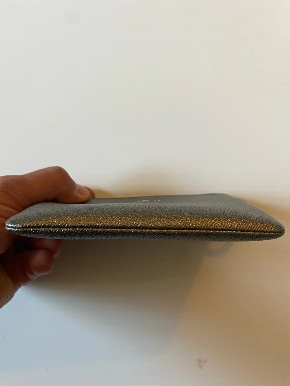 Coach Corner Zip Leather Wristlet in Silver and Black. F21070